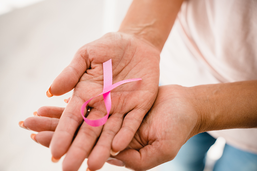 Pink ribbon in support of breast cancer. World cancer day. Charity organization, tumors oncology